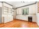 Functional kitchen with white cabinets, hardwood floors, and ample counter space at 704 Little Creek Dr, Kings Mountain, NC 28086