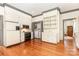 Spacious kitchen with white cabinets, modern appliances, and hardwood floors at 704 Little Creek Dr, Kings Mountain, NC 28086