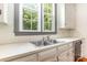 Kitchen countertop with a stainless steel sink and a view to the outside at 704 Little Creek Dr, Kings Mountain, NC 28086