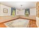 Bright living room with two large windows and hardwood floors at 704 Little Creek Dr, Kings Mountain, NC 28086