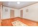 Spacious living room with hardwood floors and neutral walls at 704 Little Creek Dr, Kings Mountain, NC 28086