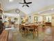 Open floorplan dining room with hardwood floors and seamless transition to other rooms at 7300 Bailywick Dr, Waxhaw, NC 28173