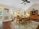 Inviting dining room with hardwood floors and comfortable seating arrangement at 7300 Bailywick Dr, Waxhaw, NC 28173
