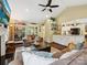 Open-concept living room with a view into the kitchen, creating an inviting and seamless flow at 7300 Bailywick Dr, Waxhaw, NC 28173