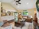 Spacious living room featuring a modern kitchen, dining area, and comfortable seating arrangement at 7300 Bailywick Dr, Waxhaw, NC 28173