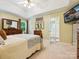Spacious bedroom with en-suite bathroom, tray ceiling, and plenty of dresser storage at 7300 Bailywick Dr, Waxhaw, NC 28173