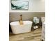 Luxurious bathroom with a freestanding tub, stylish fixtures, and calming decor at 734 Forestbrook Dr # 10, Gastonia, NC 28056