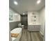 Bathroom featuring a soaking tub, glass-enclosed shower, and a modern vanity at 734 Forestbrook Dr # 10, Gastonia, NC 28056