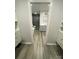 View through closet space into a full, beautifully appointed bathroom with modern amenities at 734 Forestbrook Dr # 10, Gastonia, NC 28056