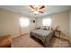 Comfortable bedroom with a ceiling fan and neutral decor at 734 Forestbrook Dr # 10, Gastonia, NC 28056