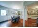 Dining room with hardwood floors, a modern chandelier, and four chairs at 734 Forestbrook Dr # 10, Gastonia, NC 28056