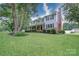 Charming two-story home with brick and siding, a covered front porch, and a well-manicured lawn and mature trees at 734 Forestbrook Dr # 10, Gastonia, NC 28056