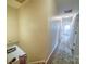 Upstairs hallway featuring a patterned rug, neutral walls, and views into the bedrooms at 734 Forestbrook Dr # 10, Gastonia, NC 28056