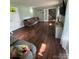 A living room features hardwood floors, fresh paint, and abundant light at 734 Forestbrook Dr # 10, Gastonia, NC 28056
