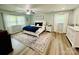 Spacious and well-lit primary bedroom with a ceiling fan and ample space at 734 Forestbrook Dr # 10, Gastonia, NC 28056