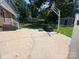Backyard patio area with outdoor seating and a basketball hoop, perfect for entertaining and enjoying outdoor activities at 734 Forestbrook Dr # 10, Gastonia, NC 28056
