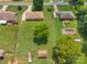 An aerial view shows a home with a large lawn and an in-ground pool at 888 Stowe Ln, Gastonia, NC 28056