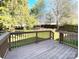 Spacious wood deck overlooking a large, tree-filled backyard with a privacy fence at 9146 Austin Ridge Ln, Charlotte, NC 28214