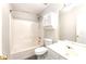 Bathroom features a vanity, tub/shower, and toilet with a mirror and lighting and functional storage at 9146 Austin Ridge Ln, Charlotte, NC 28214