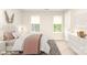 Staged bedroom featuring two windows, a white door, and stylish decor, offering a cozy, inviting space at 9146 Austin Ridge Ln, Charlotte, NC 28214