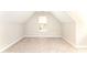 Bedroom features neutral carpet, fresh paint, and a window offering natural light to create a bright space at 9146 Austin Ridge Ln, Charlotte, NC 28214
