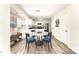 Bright eat-in kitchen with modern table, stylish chairs and ample natural light at 9146 Austin Ridge Ln, Charlotte, NC 28214