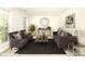 A cozy living room features stylish furnishings and a relaxing atmosphere at 9146 Austin Ridge Ln, Charlotte, NC 28214