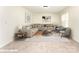 Inviting living room with large sectional sofa and modern décor for relaxing and gathering at 9146 Austin Ridge Ln, Charlotte, NC 28214