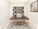 Home office with a desk, shelving unit, and area rug, ideal for a productive workspace at 9146 Austin Ridge Ln, Charlotte, NC 28214