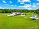 Expansive property with a pool, shed, and lush green lawn at 106 Laren Rd, Shelby, NC 28152