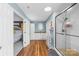 Tastefully designed bathroom with double sinks, a walk-in shower, and a water closet at 106 Laren Rd, Shelby, NC 28152