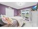 Comfortable bedroom featuring a plush bed, scenic outdoor view, and ample closet space perfect for relaxation at 106 Laren Rd, Shelby, NC 28152