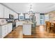 Bright kitchen with white cabinets, stainless steel appliances, and island seating at 106 Laren Rd, Shelby, NC 28152