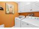 Practical laundry room with modern appliances and ample storage space, designed for convenient and efficient chore management at 106 Laren Rd, Shelby, NC 28152