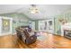 Inviting living room with a fireplace, hardwood floors, and vaulted ceiling at 106 Laren Rd, Shelby, NC 28152