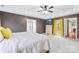 Spacious main bedroom features neutral carpet, stylish furniture, and a door to the exterior at 106 Laren Rd, Shelby, NC 28152