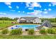 Backyard pool with a slide, lounge chairs, and manicured landscaping at 106 Laren Rd, Shelby, NC 28152