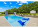Beautiful backyard pool with a slide, lounge chairs, and ample space, perfect for relaxing and entertaining guests at 106 Laren Rd, Shelby, NC 28152