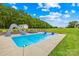 Enjoy outdoor fun with this backyard pool, complete with a water slide, tanning deck, and ample green space for recreation at 106 Laren Rd, Shelby, NC 28152