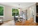 Charming breakfast nook with a large window, a stylish table, and a built-in hutch for extra storage at 110 St Sophia Ct, Mooresville, NC 28117