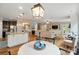Bright and airy open-concept kitchen, dining, and living space ideal for entertaining and Gathering living at 110 St Sophia Ct, Mooresville, NC 28117