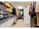 Organized walk-in closet with ample shelving, hanging space, and neat storage solutions at 110 St Sophia Ct, Mooresville, NC 28117
