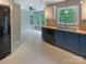 Modern kitchen featuring stainless steel sink, updated appliances, and butcher block countertops at 12092 Spinnaker Dr, Fort Mill, SC 29708