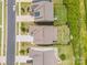 An aerial view shows the roof lines, driveways, and fenced yards of neighboring properties at 150 Haddonsfield Dr, Mooresville, NC 28115