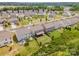 Overview of a neighborhood with tree-lined streets and manicured lawns on a sunny day at 150 Haddonsfield Dr, Mooresville, NC 28115