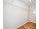 Walk-in closet with installed shelving for storage at 150 Haddonsfield Dr, Mooresville, NC 28115