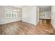 An elegant dining room with hardwood floors and wainscoting at 150 Haddonsfield Dr, Mooresville, NC 28115