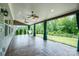 Covered patio with a hammock, ceiling fans, recessed lighting, and view of the backyard at 150 Haddonsfield Dr, Mooresville, NC 28115