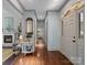 Welcoming foyer with hardwood floors, neutral walls, and a view into the living room at 150 Pinnacle Shores Dr, Mooresville, NC 28117