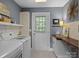 Functional laundry room featuring modern appliances and ample storage space at 150 Pinnacle Shores Dr, Mooresville, NC 28117